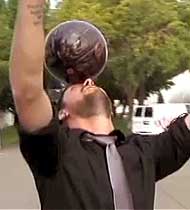 Matt Balancing a Bowling Ball on His Head