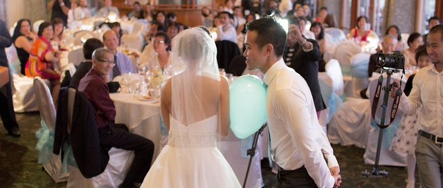 Bride and Groom Playing a Wedding Game