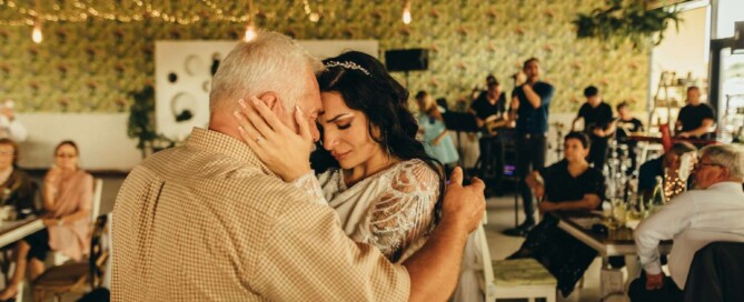 Bride dancing with her father during wedding reception